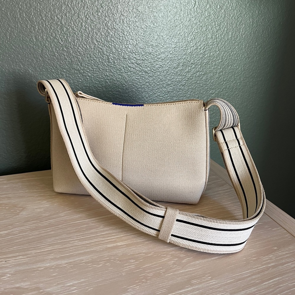 Rothy’s The Casual Crossbody in Parchment. Washable bag
